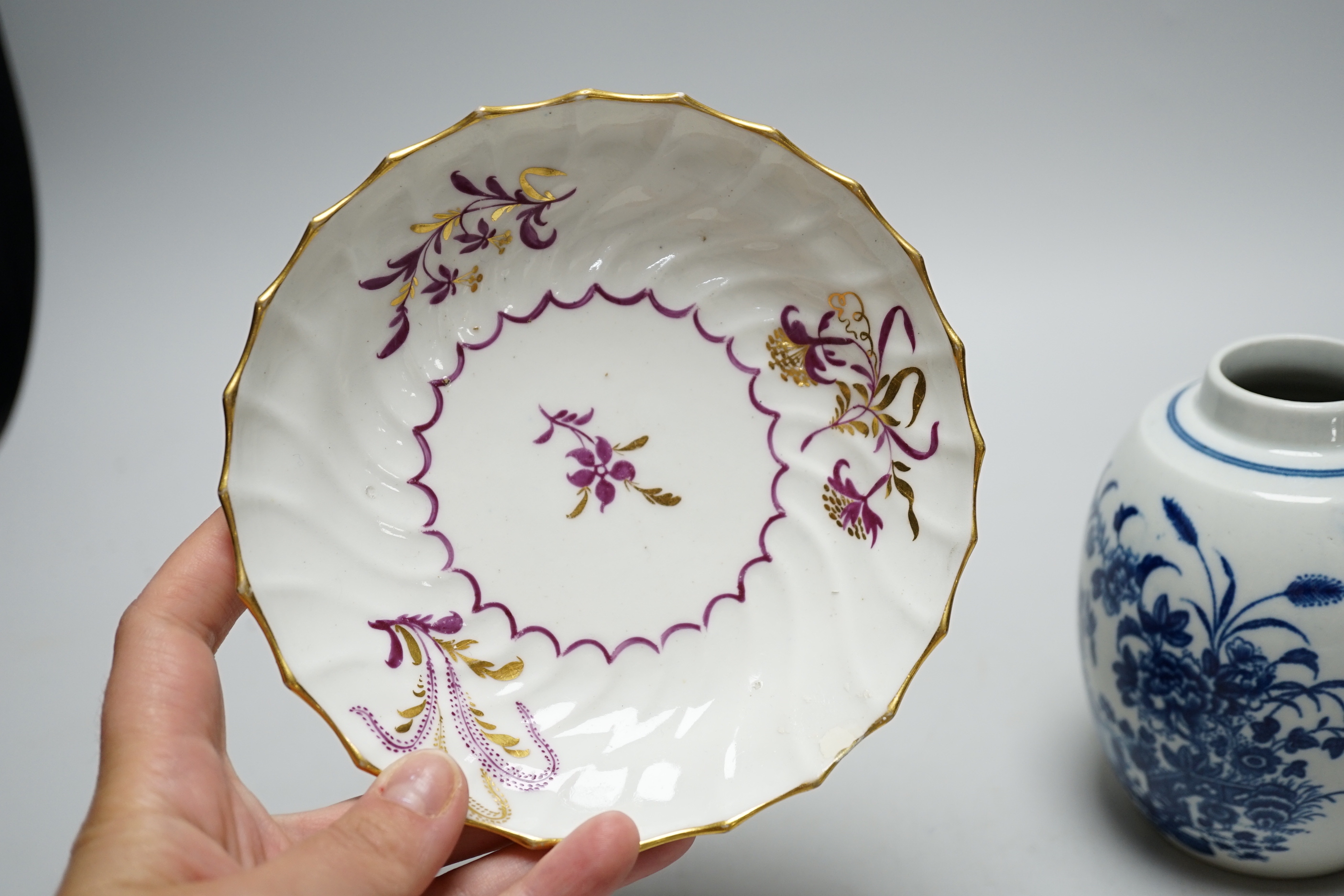 A Worcester Fence pattern tea canister, c.1775, and a Worcester wrythen coffee cup and saucer, c.1795